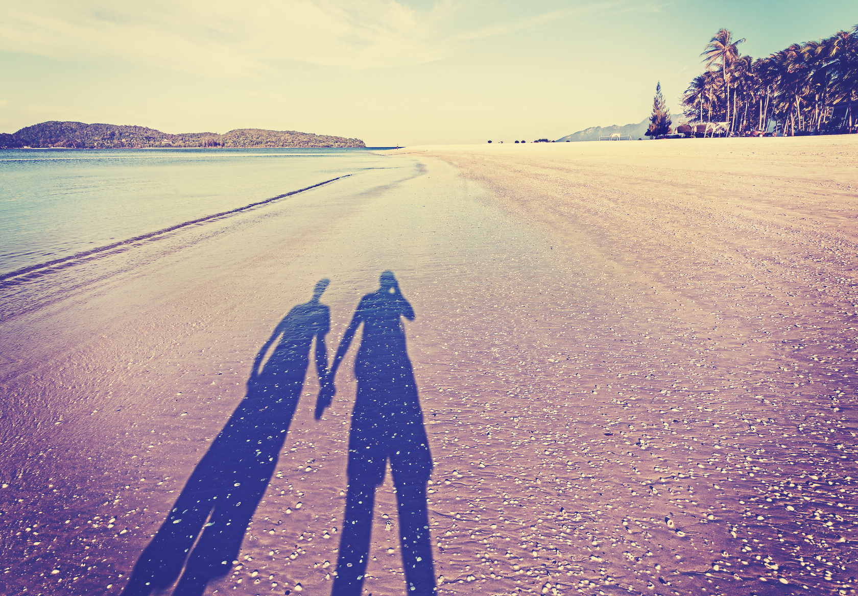 Couple's Shadow on Beach
